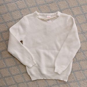 White sweater with pearls